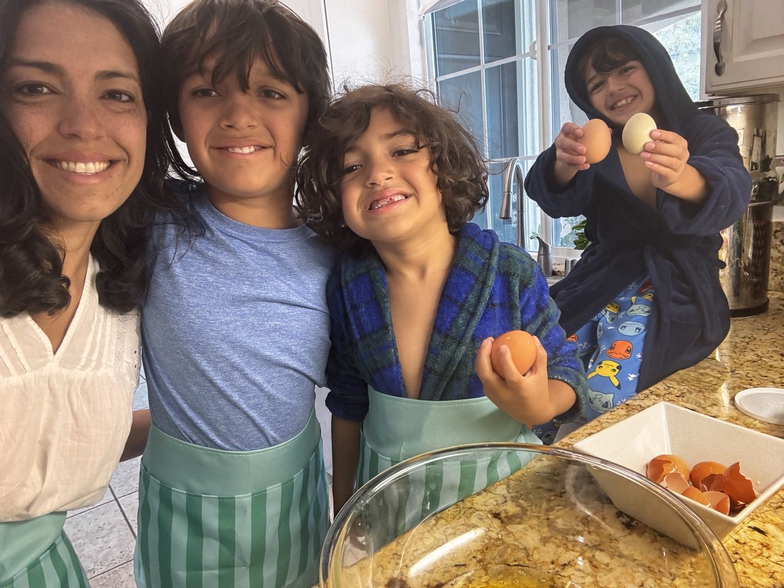Kenia baking with her boys